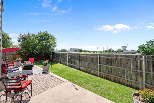 1913 Avante Dr, Cedar Park, TX 78613 - fenced backyard featuring a patio and an outdoor fire pit