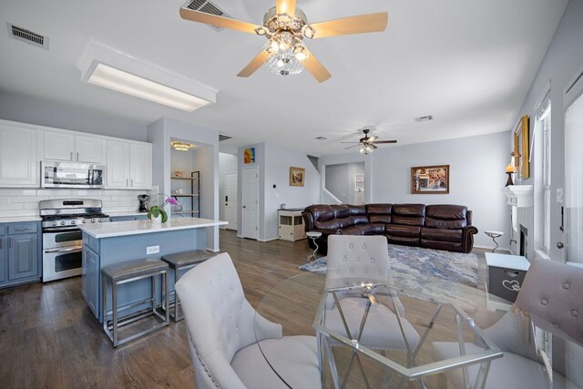 1913 Avante Dr, Cedar Park, TX 78613 - dining room with a ceiling fan and dark wood-type flooring