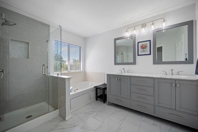 1913 Avante Dr, Cedar Park, TX 78613 - full bathroom featuring double vanity, marble look tiles, a bath, and a stall shower