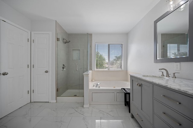 1913 Avante Dr, Cedar Park, TX 78613 - bathroom featuring vanity, a garden tub, a stall shower, and marble look tiles