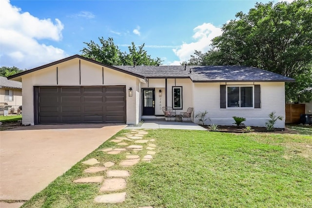 2402 Broken Oak Dr, Austin, TX 78745 - single story home featuring a garage, concrete driveway, brick siding, a front yard, and roof with shingles