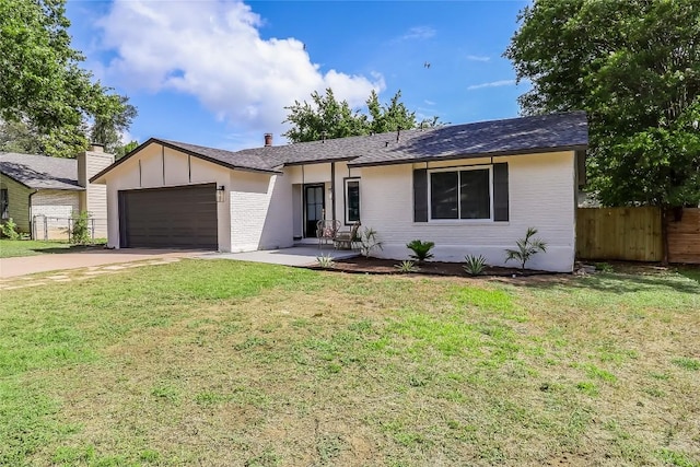 2402 Broken Oak Dr, Austin, TX 78745 - ranch-style home with an attached garage, driveway, roof with shingles, board and batten siding, and brick siding