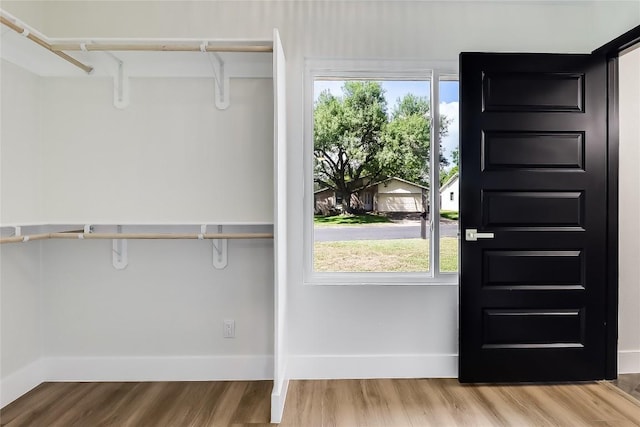 2402 Broken Oak Dr, Austin, TX 78745 - spacious closet with wood finished floors
