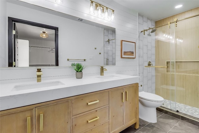 2402 Broken Oak Dr, Austin, TX 78745 - full bath featuring a shower stall, double vanity, and tile patterned floors
