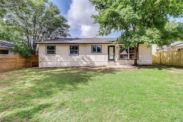 2402 Broken Oak Dr, Austin, TX 78745 - back of property with a fenced backyard