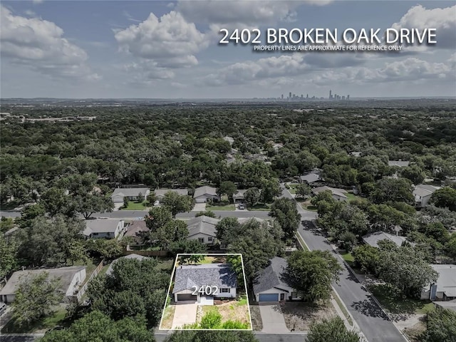 2402 Broken Oak Dr, Austin, TX 78745 - aerial view of residential area featuring property boundaries highlighted and a forest