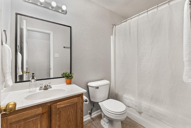 5302 Oster Dr, Killeen, TX 76542 - full bathroom with vanity, a textured wall, tile patterned flooring, and shower / bath combo with shower curtain