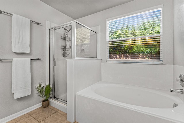 5302 Oster Dr, Killeen, TX 76542 - bathroom with a garden tub, a stall shower, and tile patterned flooring