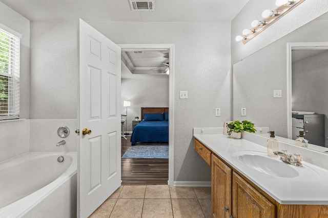 5302 Oster Dr, Killeen, TX 76542 - ensuite bathroom with vanity, a bath, and tile patterned flooring