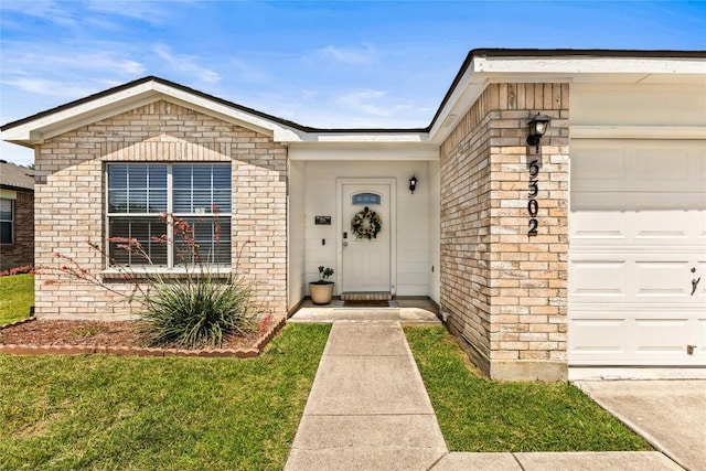 5302 Oster Dr, Killeen, TX 76542 - property entrance with an attached garage and brick siding