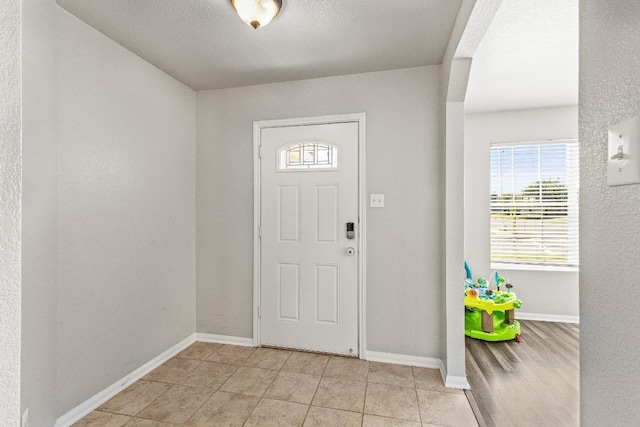 5302 Oster Dr, Killeen, TX 76542 - foyer entrance featuring baseboards and light tile patterned floors