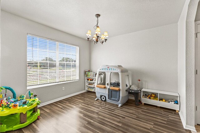 5302 Oster Dr, Killeen, TX 76542 - recreation room with a chandelier and wood finished floors