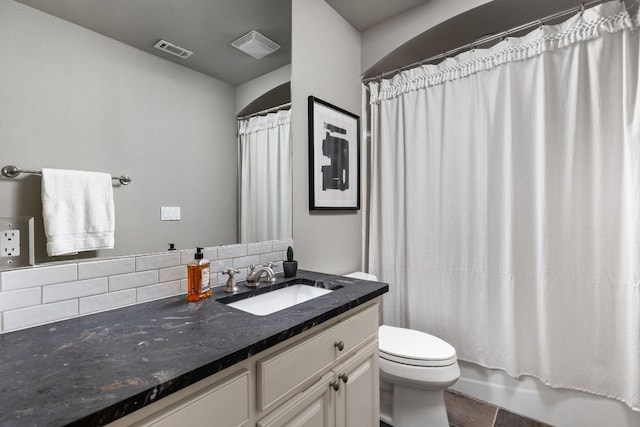 8634 Navidad Dr, Austin, TX 78735 - bathroom featuring tasteful backsplash, vanity, and shower / bath combo with shower curtain