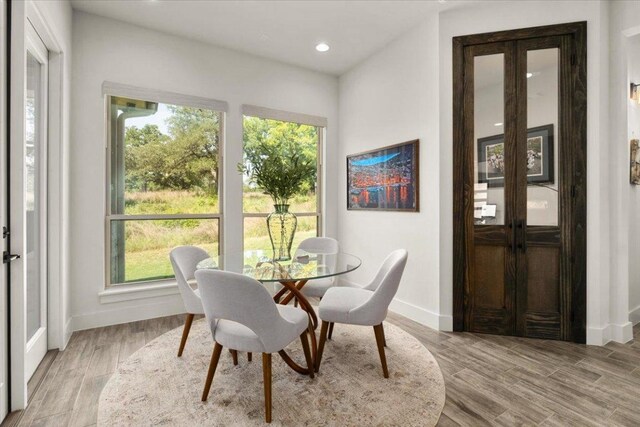 230 Wilderness Cv, Driftwood, TX 78619 - dining room with wood finished floors and recessed lighting
