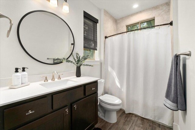 230 Wilderness Cv, Driftwood, TX 78619 - bathroom featuring vanity, wood finished floors, and a shower with curtain