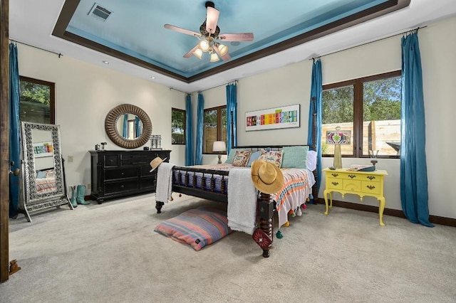 3816 Pappys Way, Austin, TX 78730 - bedroom featuring a raised ceiling, carpet, and multiple windows