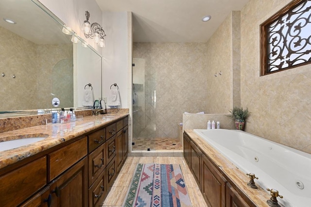 3816 Pappys Way, Austin, TX 78730 - full bathroom with a shower stall, a jetted tub, double vanity, tile patterned flooring, and tile walls