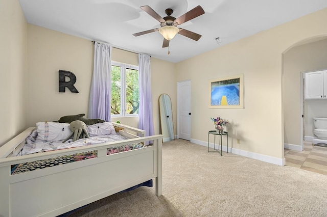 3816 Pappys Way, Austin, TX 78730 - bedroom featuring arched walkways, light colored carpet, ceiling fan, and connected bathroom