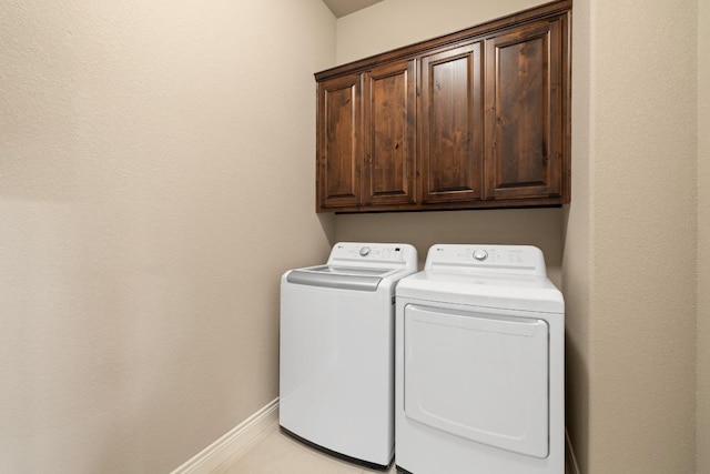 108 Marbella Way, Georgetown, TX 78633 - washroom featuring cabinet space and washing machine and clothes dryer