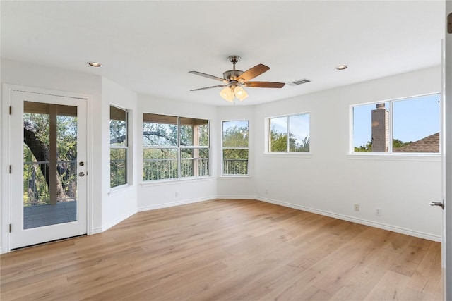 403 Hazeltine Dr, Lakeway, TX 78734 - spare room featuring healthy amount of natural light, ceiling fan, light wood finished floors, and recessed lighting