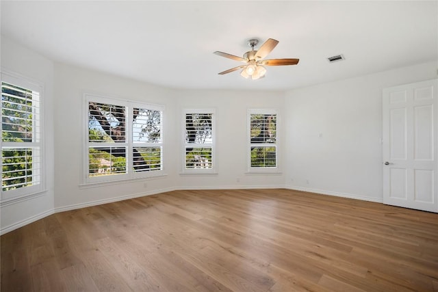403 Hazeltine Dr, Lakeway, TX 78734 - empty room featuring a ceiling fan and light wood finished floors
