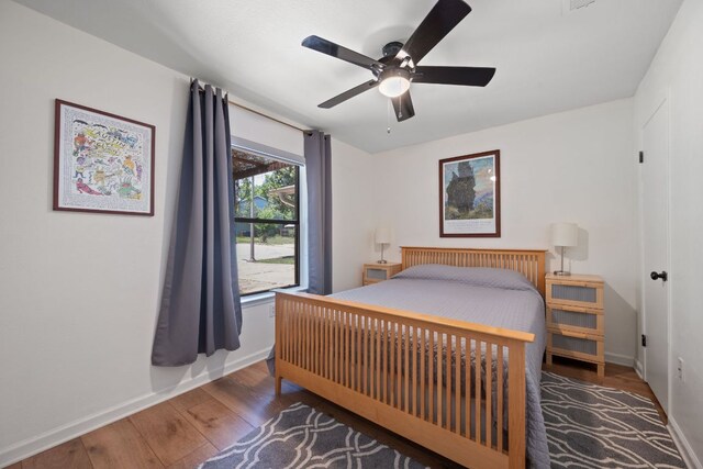 2801 Cornish Cir, Austin, TX 78745 - bedroom featuring wood-type flooring, a ceiling fan, and radiator heating unit