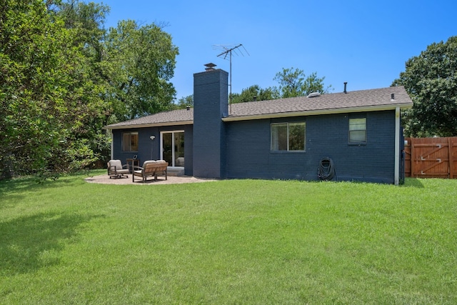 2801 Cornish Cir, Austin, TX 78745 - rear view of house featuring a chimney, a patio, and brick siding