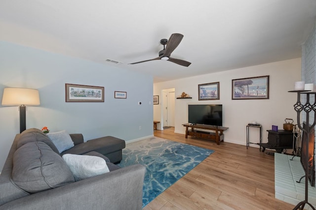 2801 Cornish Cir, Austin, TX 78745 - living area featuring wood finished floors and a ceiling fan