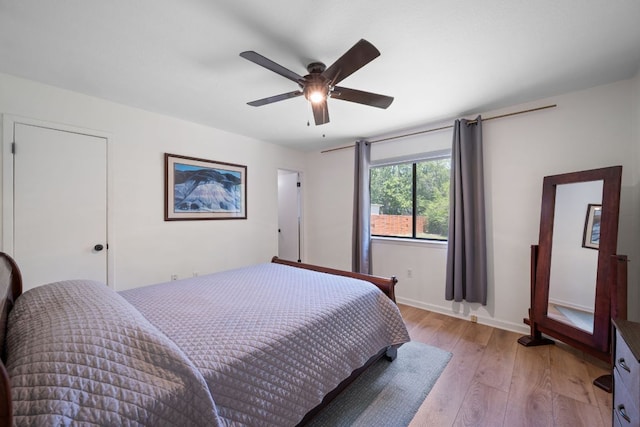 2801 Cornish Cir, Austin, TX 78745 - bedroom with light wood-style flooring and a ceiling fan