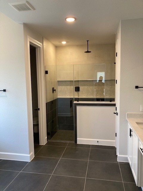 120 Prairie Clover Dr, Dripping Springs, TX 78620 - full bathroom with a shower stall, vanity, tile patterned flooring, and recessed lighting