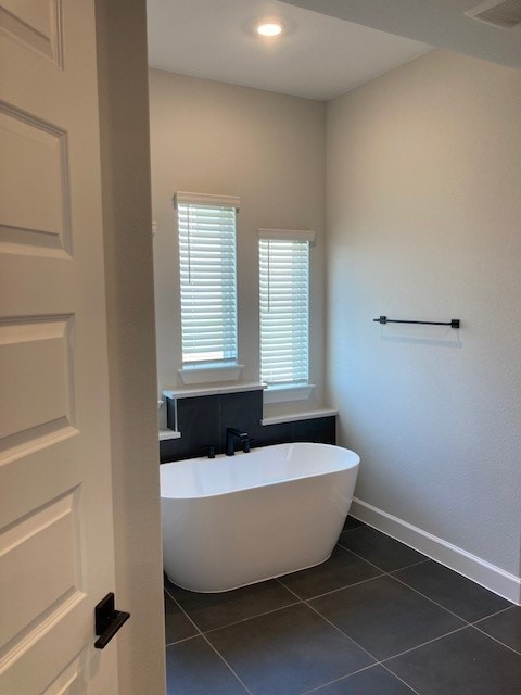 120 Prairie Clover Dr, Dripping Springs, TX 78620 - full bath with tile patterned flooring, a freestanding bath, and recessed lighting