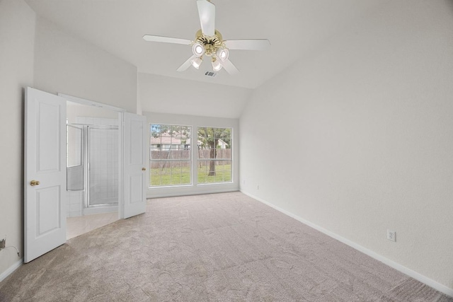 706 Cornell Dr, Pflugerville, TX 78660 - unfurnished bedroom with carpet, vaulted ceiling, ceiling fan, and connected bathroom