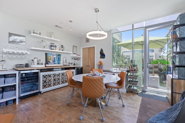 1600 Barton Springs Rd Unit 5406, Austin, TX 78704 - dining area with wood finished floors, a dry bar, and beverage cooler