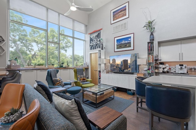 1600 Barton Springs Rd Unit 5406, Austin, TX 78704 - living area with a towering ceiling, a ceiling fan, and healthy amount of natural light