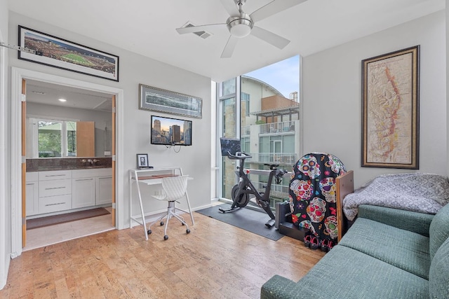 1600 Barton Springs Rd Unit 5406, Austin, TX 78704 - home office with light wood-style floors and a ceiling fan