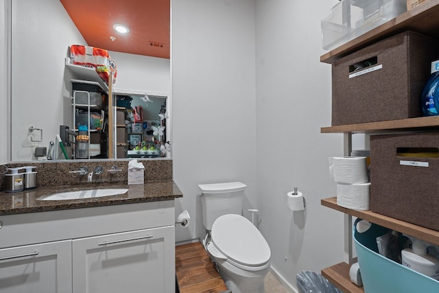 1600 Barton Springs Rd Unit 5406, Austin, TX 78704 - half bathroom with wood finished floors and vanity