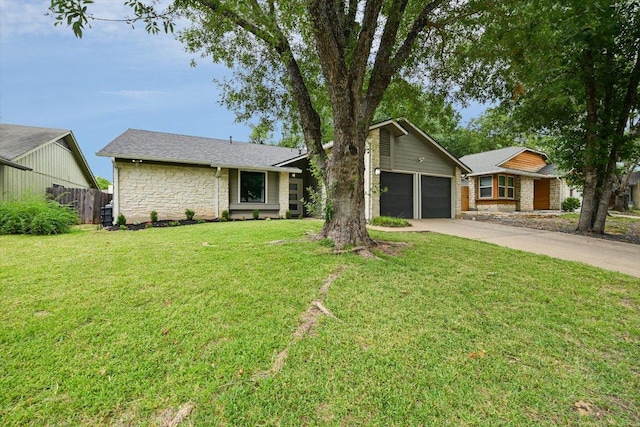 7906 Swindon Ln, Austin, TX 78745 - mid-century modern home featuring stone siding and driveway