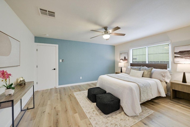 7906 Swindon Ln, Austin, TX 78745 - bedroom featuring light wood-type flooring and ceiling fan