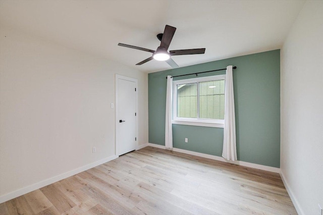7906 Swindon Ln, Austin, TX 78745 - empty room featuring wood finished floors and a ceiling fan