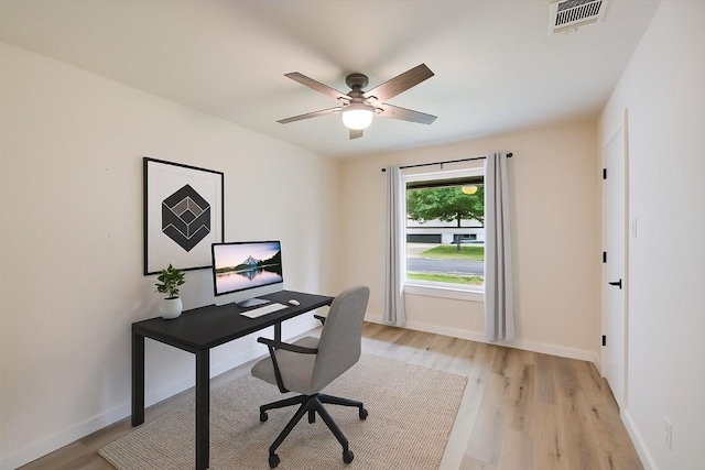 7906 Swindon Ln, Austin, TX 78745 - home office featuring light wood-style floors and ceiling fan