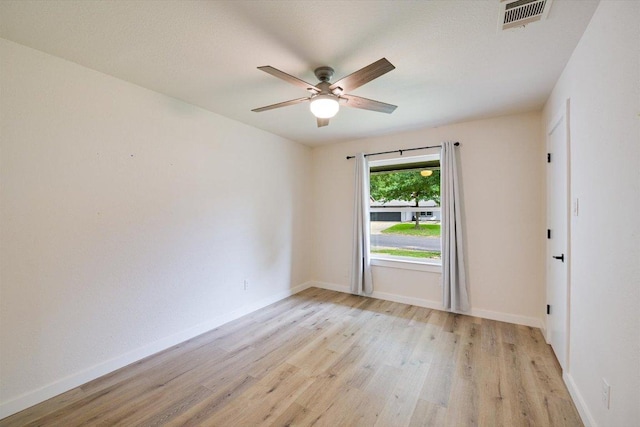 7906 Swindon Ln, Austin, TX 78745 - unfurnished room with a ceiling fan and light wood-type flooring