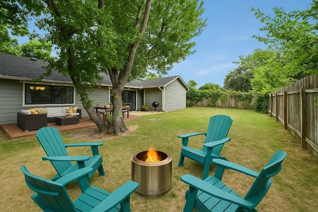 7906 Swindon Ln, Austin, TX 78745 - fenced backyard featuring an outdoor living space with a fire pit