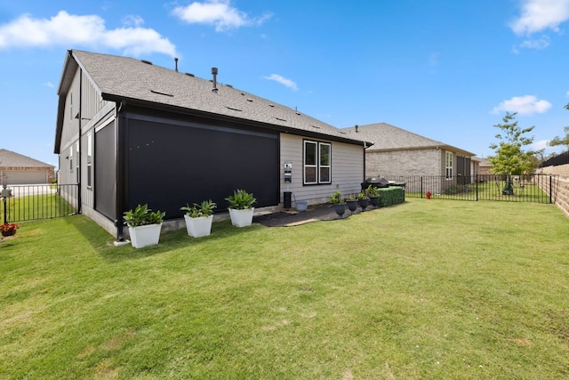 614 W Martingale St W, Georgetown, TX 78633 - back of house with a fenced backyard and roof with shingles