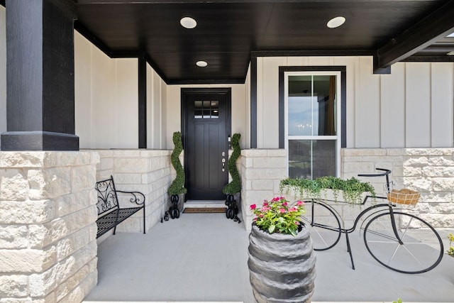 614 W Martingale St W, Georgetown, TX 78633 - doorway to property with a porch, board and batten siding, and stone siding