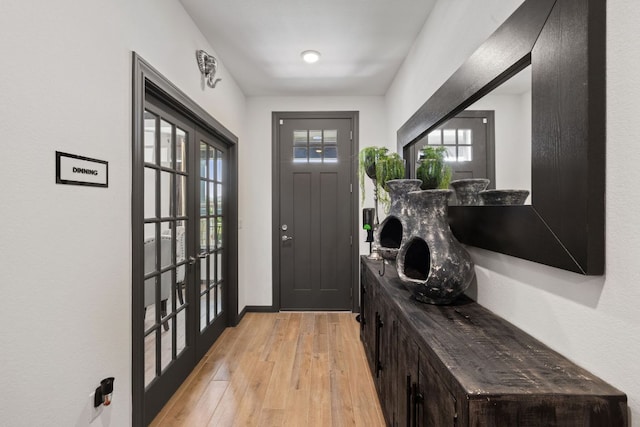 614 W Martingale St W, Georgetown, TX 78633 - foyer with light wood-style flooring and baseboards