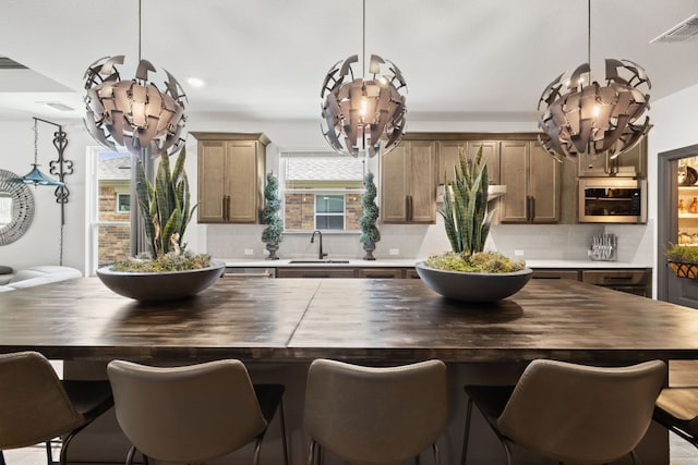 614 W Martingale St W, Georgetown, TX 78633 - dining space featuring a chandelier