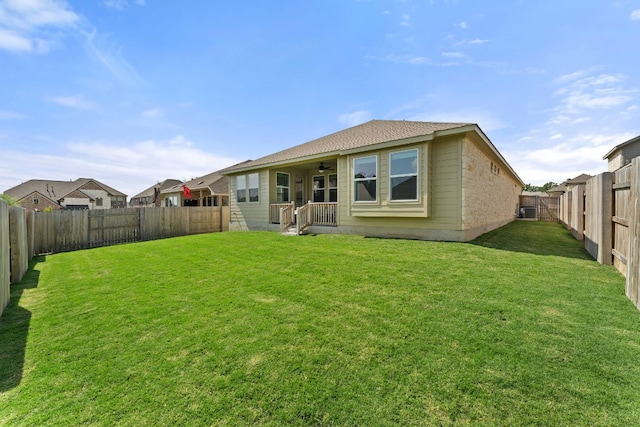 2004 Long Shadow Ln, Georgetown, TX 78628 - back of property with a ceiling fan and a fenced backyard