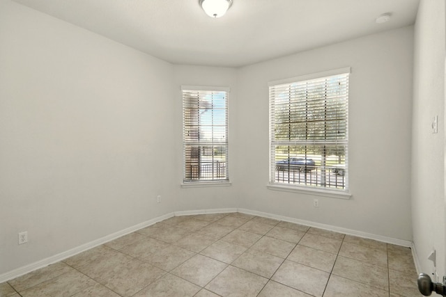 2516 Silver Fern Ln, Pflugerville, TX 78660 - empty room with light tile patterned floors and a smoke detector
