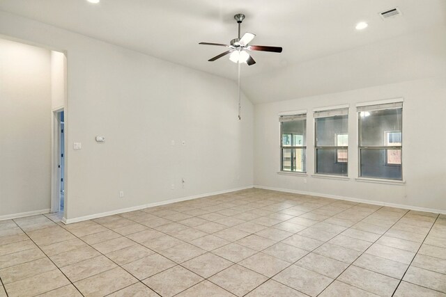 2516 Silver Fern Ln, Pflugerville, TX 78660 - empty room with a ceiling fan, lofted ceiling, light tile patterned floors, and recessed lighting