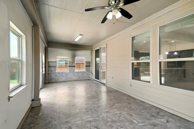 2516 Silver Fern Ln, Pflugerville, TX 78660 - unfurnished sunroom featuring crown molding